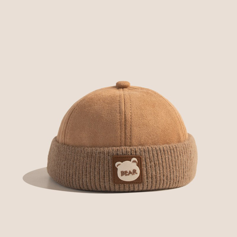 Otoño y invierno coreano estilo exterior sin bordes de color engrosado sombrero de niños para hombres y mujeres bebés caliente sombrero de piel de melón de moda universal