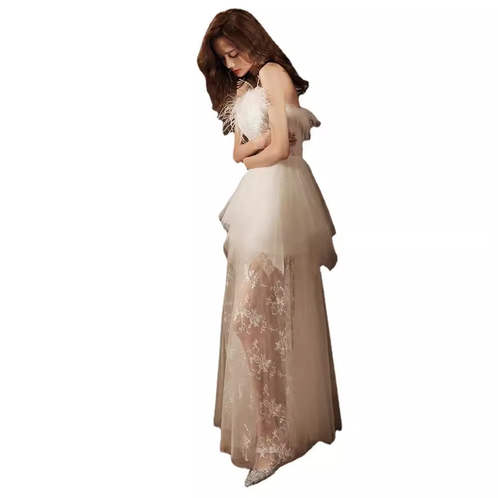 Đầm maxi nữ thắt eo phong cách tiên nữ kiểu Pháp, tay phồng lông vũ, dự tiệc sang trọng — Ống ngực lông vũ váy trắng nửa trong suốt