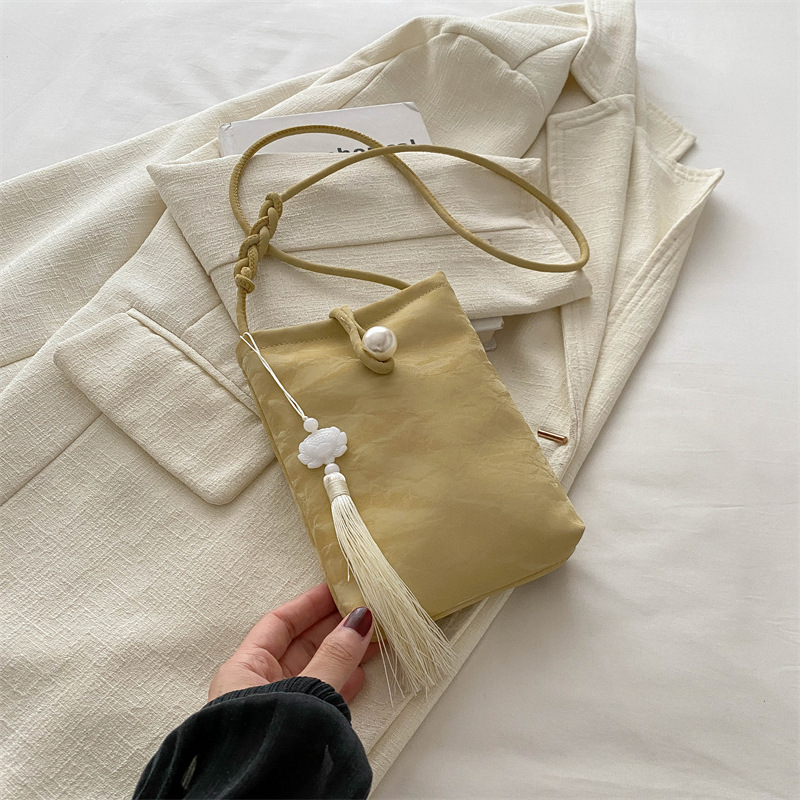 Nueva bolso chino para mujeres 2024 verano nuevo estilo nacional bolso de mano pequeño bolso ligero con cheongsam perla bolso móvil