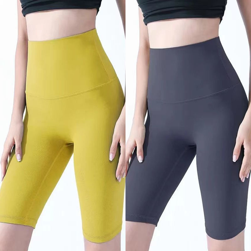 Pantalones cortos desnudos de mujer elásticos apretados para elevar las caderas de cinco puntos pantalones deportivos de secado rápido succión de sudor entrenamiento para correr fábrica de comercio de ping