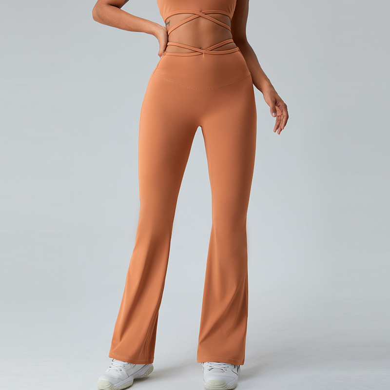 Cintura transfronteriza Correa delgada pantalones cruzados de yoga pantalones de pierna ancha de cintura alta desnuda de mujer corriendo deportes fitness ropa de yoga