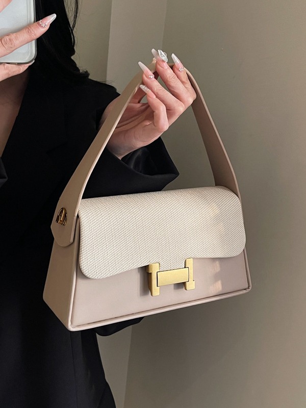 Bolsa de mano de alta sensación para mujeres 2026 nuevo estilo de moda versátil bolso de hombro nicho retro bolso de color de contraste