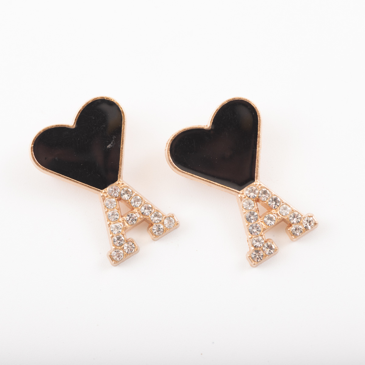 brooch with letters