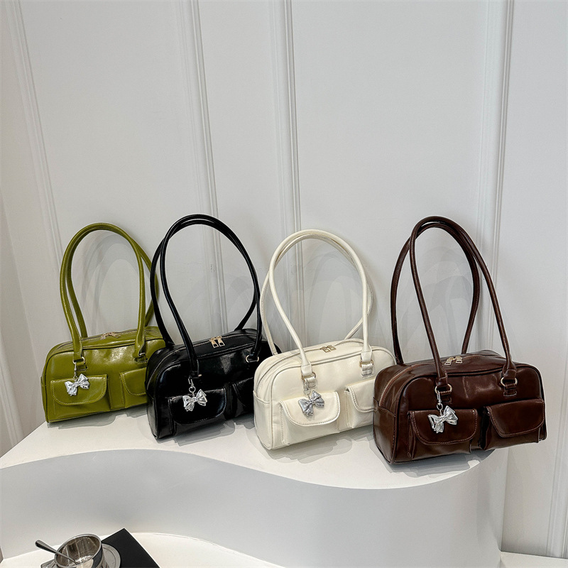 Bolsa de brazo retro para mujeres 2025 nueva textura de un solo hombro bolso de mano nicho de gran capacidad Volkswagen bolso de doble bolsillo