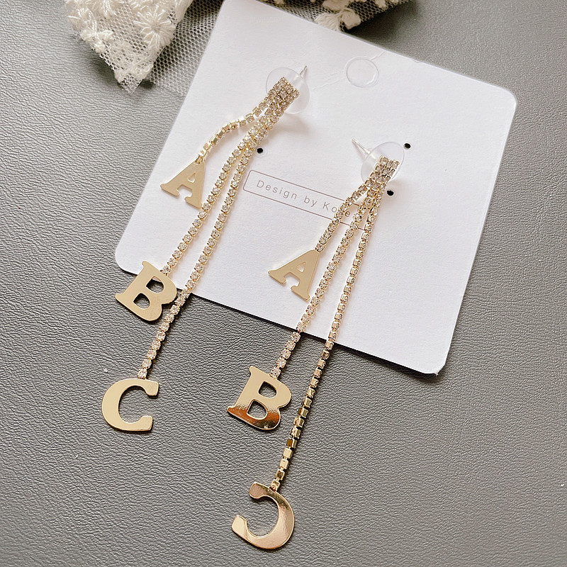 Korean Letter Tassel Asymmetric Long Earrings display picture 7