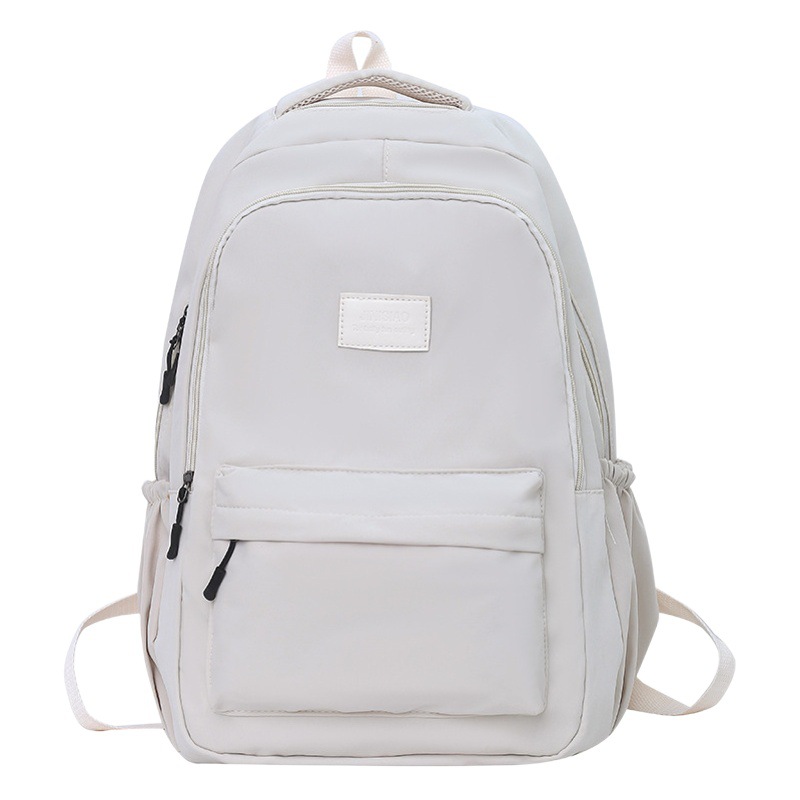 Mochila de comercio exterior 2023 nueva mochila de estudiante de escuela primaria y secundaria coreano simple Harajuku mochila popular en línea al por mayor