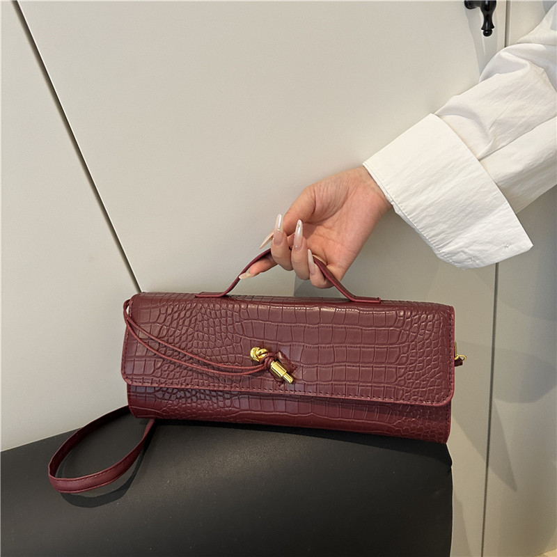 2025 verano temperamento tendencia nuevo temperamento bolso de palo francés con bloqueo diagonal bolso horizontal bolso de mensajero de un solo hombro bolso femenino