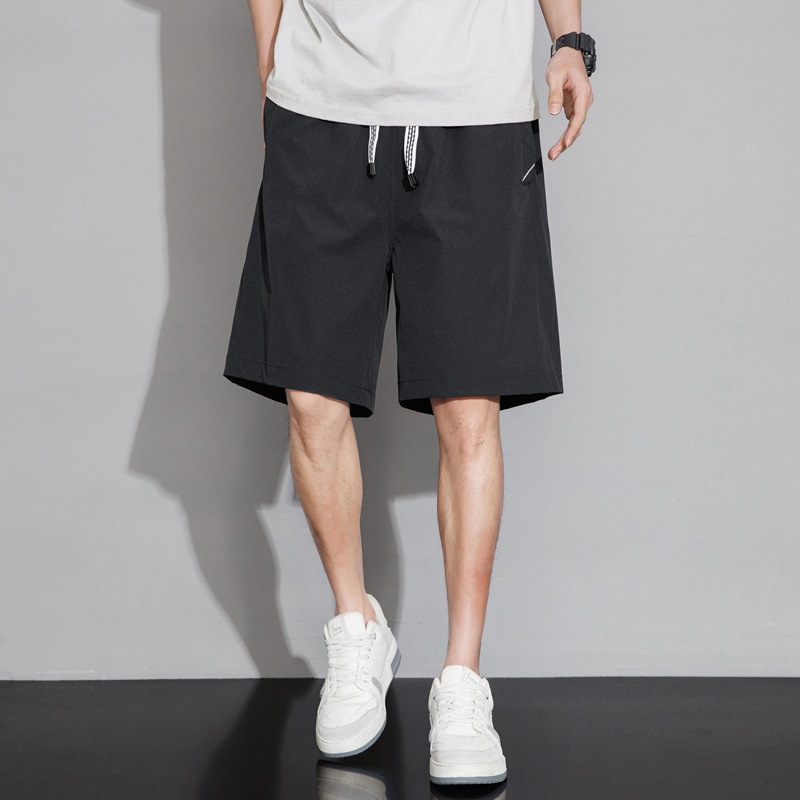 Nuevos pantalones cortos de verano para hombres, cinco puntos de la ciudad, herramientas al aire libre, tendencia, carga, relajado, casual, simple, color sólido