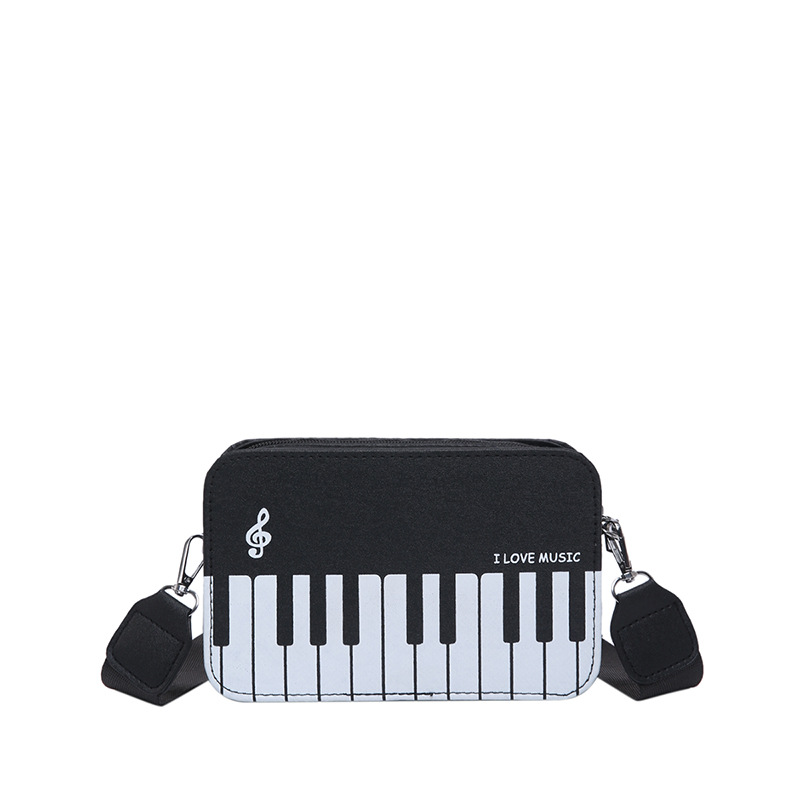 2025 invierno nueva moda color contraste pequeño bolso cuadrado niña dulce personalidad piano notas pequeñas bolso femenino portátil