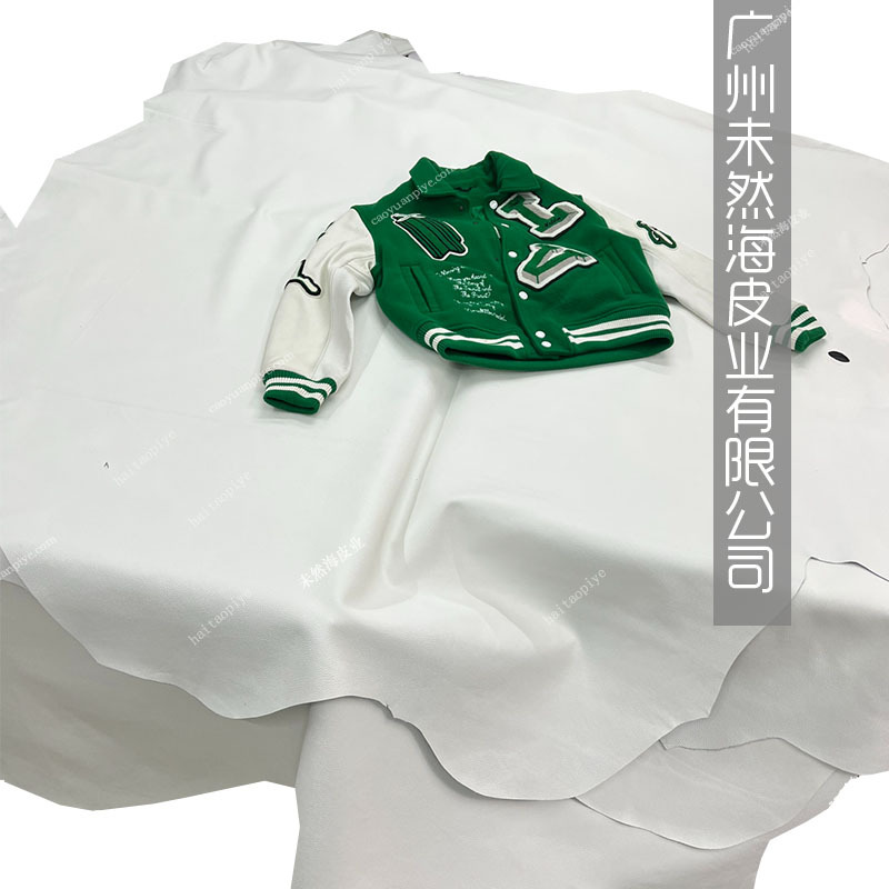 白色荔枝纹头层整张牛皮棒球服用粒面头层真皮源头厂家