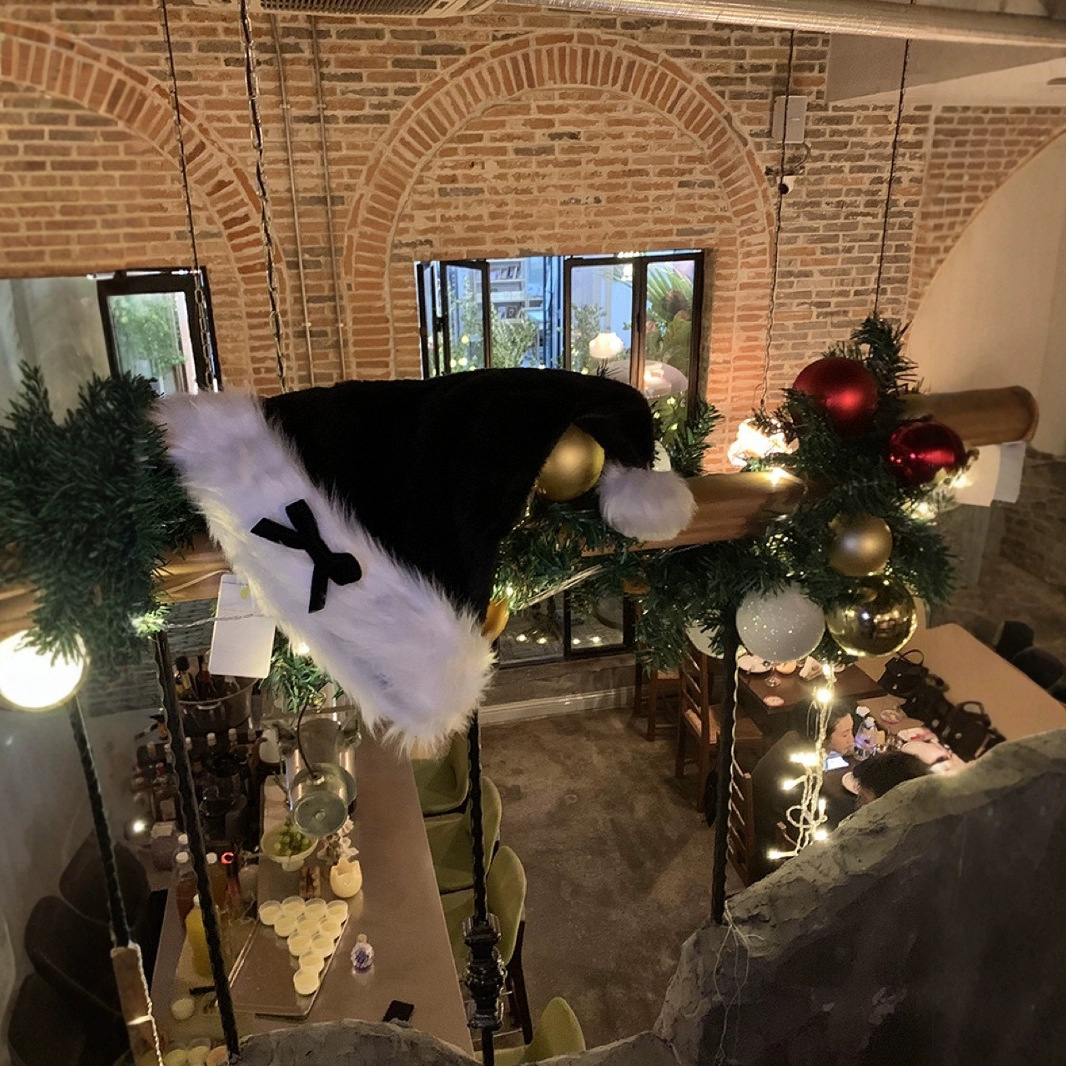 Nuevo sombrero de Navidad de arco negro dulce cool sombrero de invierno de niñas sombrero caliente de peluche rojo sombrero de Navidad