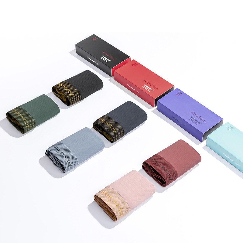 En caja sin costuras ropa interior de seda de hielo para hombres jóvenes boxeadores de color sólido malla de cintura media boxeadores transpirables sueltos verano