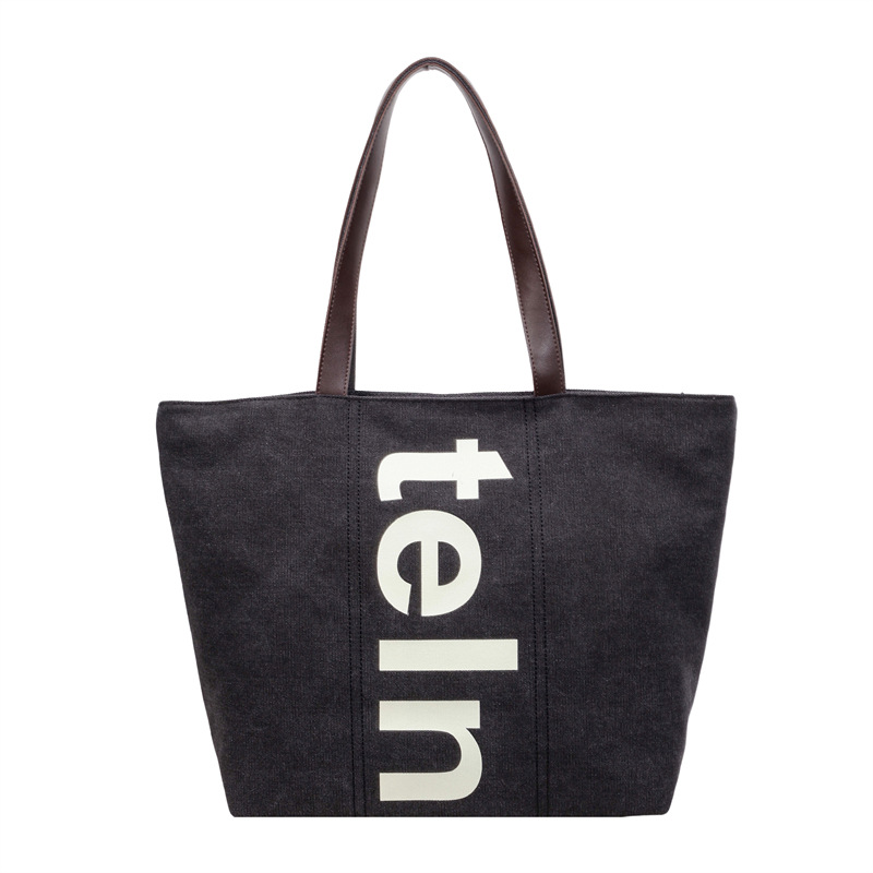 2026 nueva bolsa de hombro coreana versátil bolsa de lona casual para estudiantes universitarios de clase simple bolsa de viaje diario