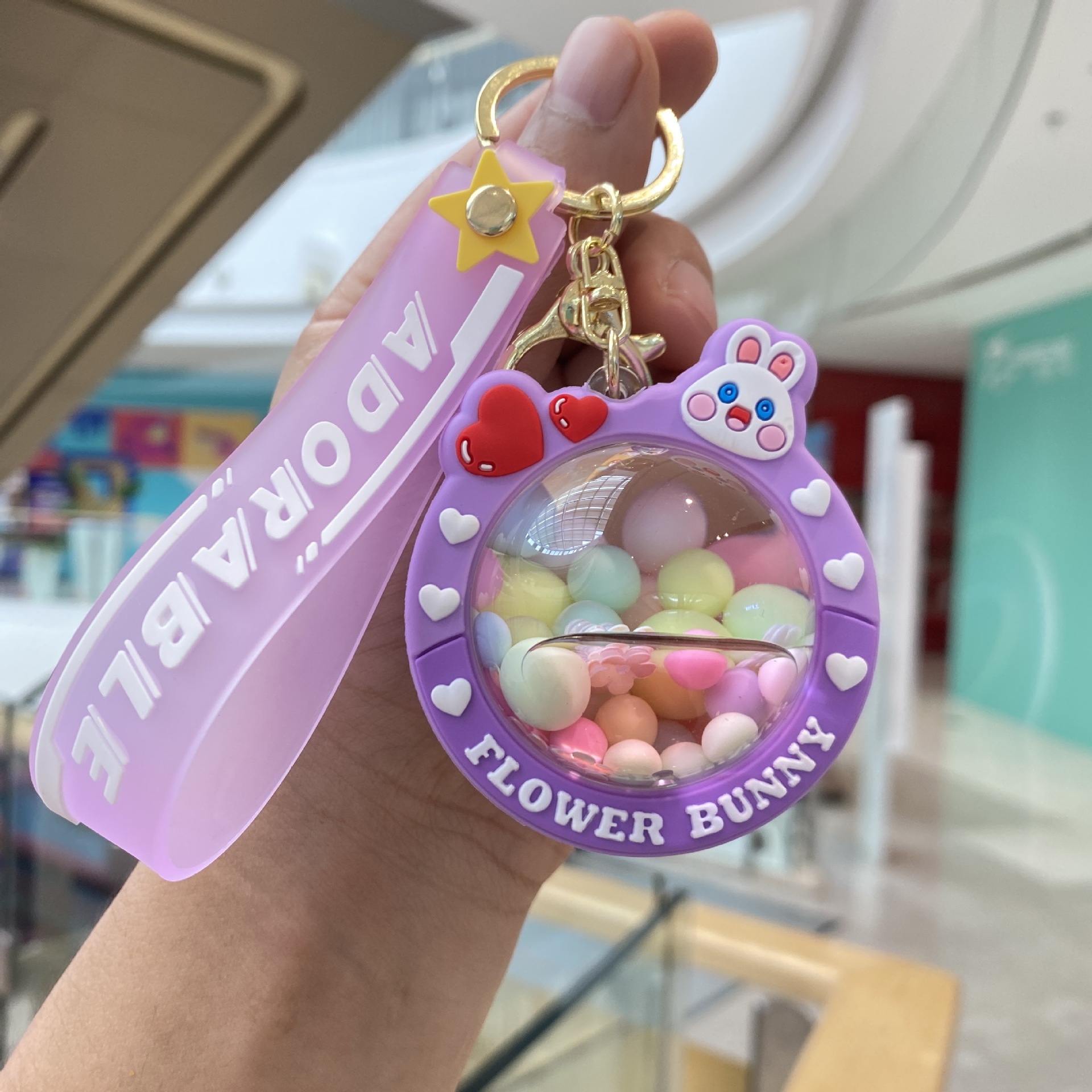 Acrílico lleno de aceite de melocotón llavero pareja bolsa colgante coche llavero lindo pequeño regalo al por mayor