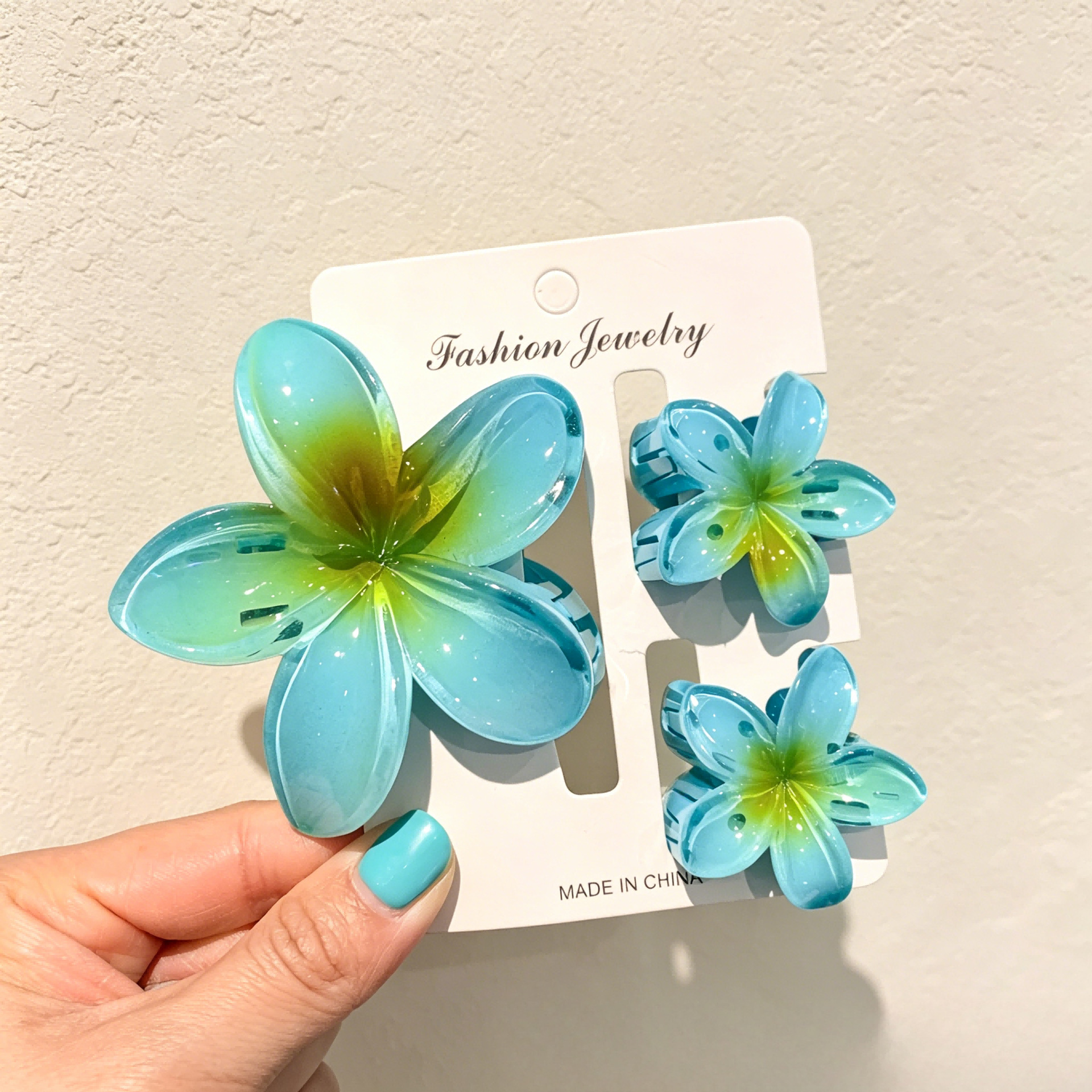 Ventas transfronterizas calientes nuevos huevos láser de dos colores clip de agarramiento de flores de cabeza posterior clip de tiburón clip de cabello joyerías para el cabello