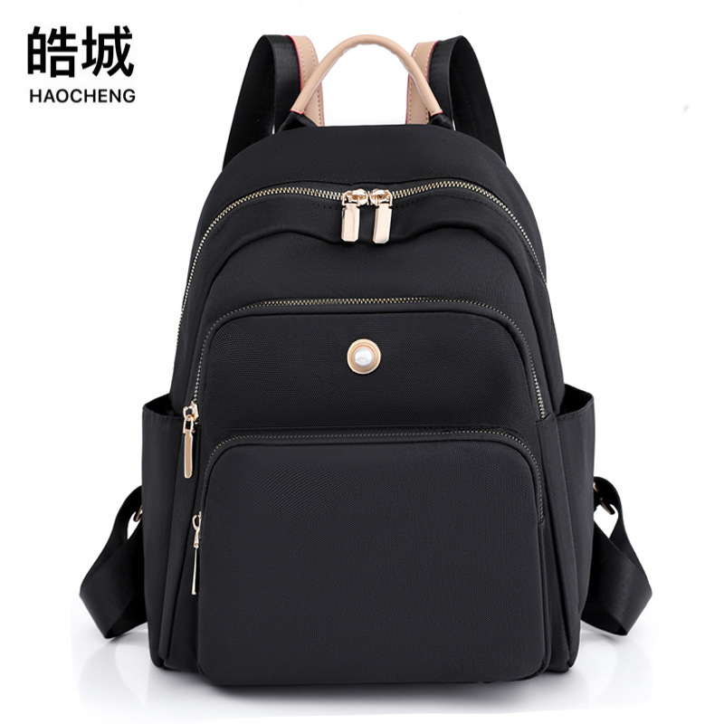 Comercio exterior al por mayor 2022 invierno nuevo estilo casual mujer Oxford mochila simple y versátil mochila para computadora de gran capacidad