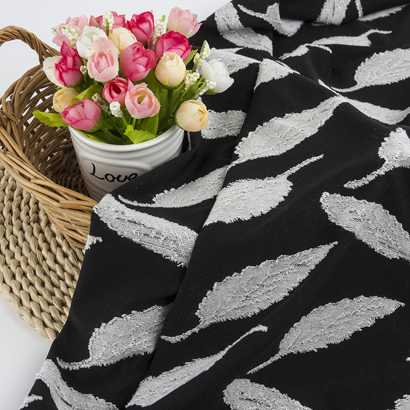 厂家现货直销 针织面料飞线提花 色织提花 时装裙装面料 叶子花型