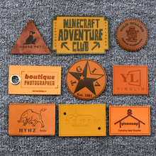 源头工厂超纤皮标皮牌PU热压真皮牛仔裤箱包服饰皮革彩印商标