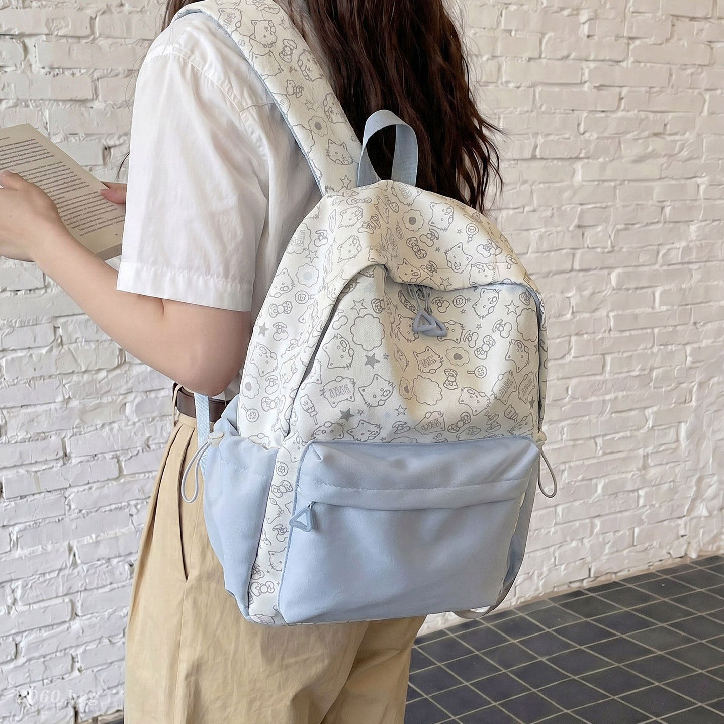 Bolsa de escuela secundaria de dibujos animados universales 2026 viaje ocio nueva mochila de gran capacidad impresión popular