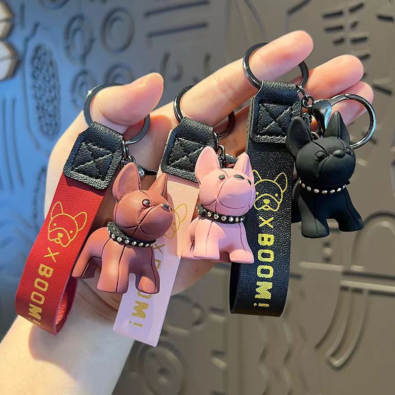 Creativo, colorido, violento, muñeca de oso de dragón, método de lucha de perros, llavero de muñeca de moda, llavero de personalidad de coche