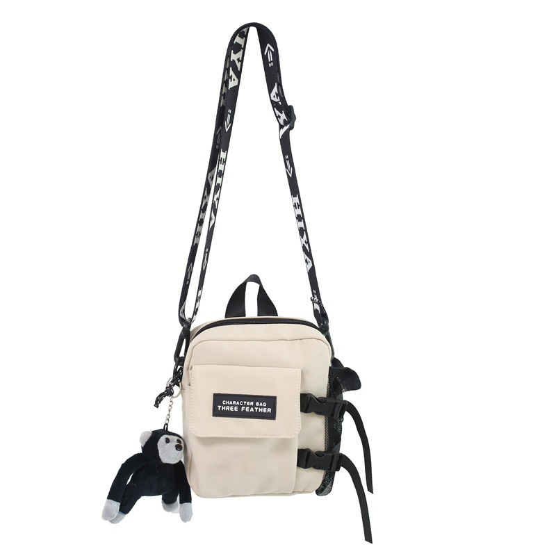 Bolso de hombro pequeño para hombres y mujeres bolso de estilo ins de alto valor para mujer nuevo estilo coreano casual Harajuku bolso de mensajero de hombro para mujer