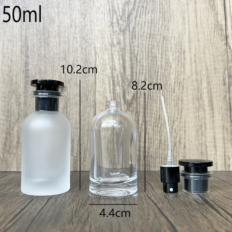 Spot B100-30ml 50ml 100ml botella redonda simple cubierta negra de vidrio frasco de spray portátil de perfume