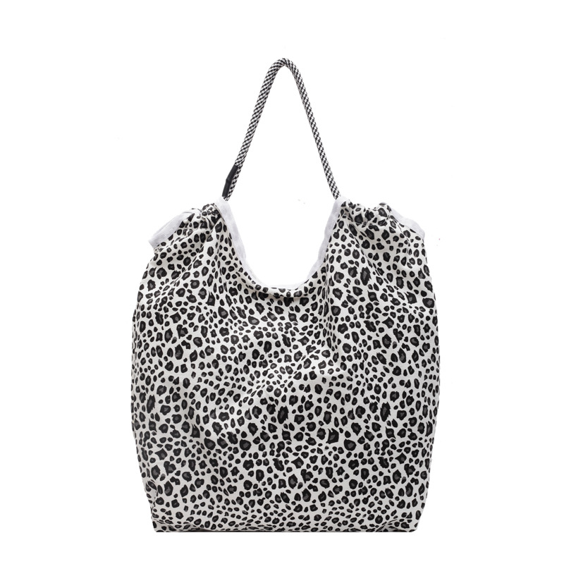 Versión coreana del bolso de tela con estampado de leopardo súper fuego, bolso de hombro de gran capacidad para mujer, bolso de compras, bolso portátil de moda