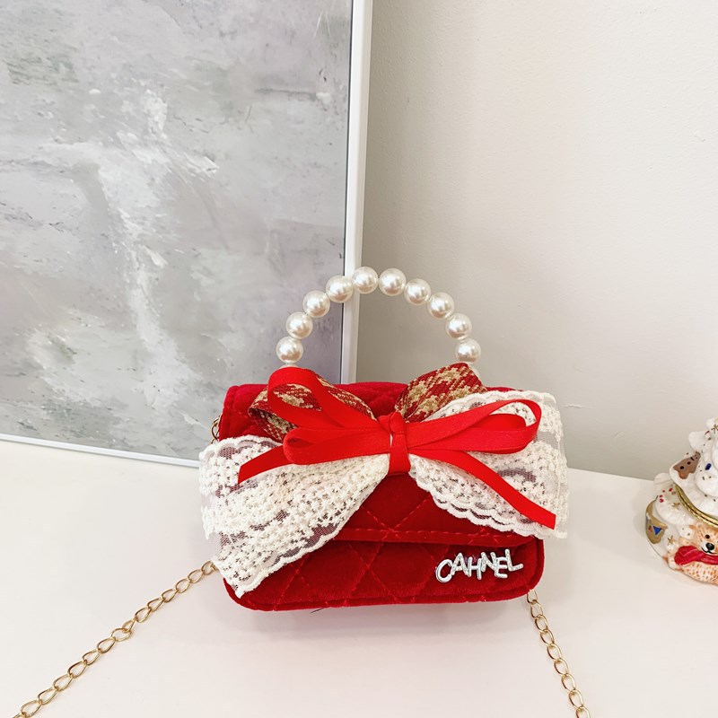 Bolso de niños nuevo bolso de perla rojo de Año Nuevo lindos princesas niñas bolso de hombro de cadena de estilo extranjero bolso de mochila