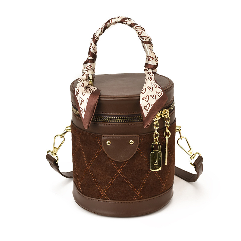 Bolso de hombro retro versátil para mujeres 2025 invierno nuevo nicho zhong mochila texturizado diamante bolso de cubo de mano