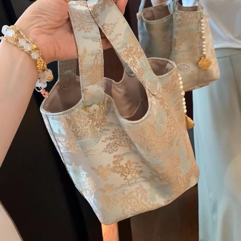 女性のための新しい中国風の脇の下バッグ 2024 夏刺繍ニッチハイエンドシングルショルダーハンドバッグ|undefined