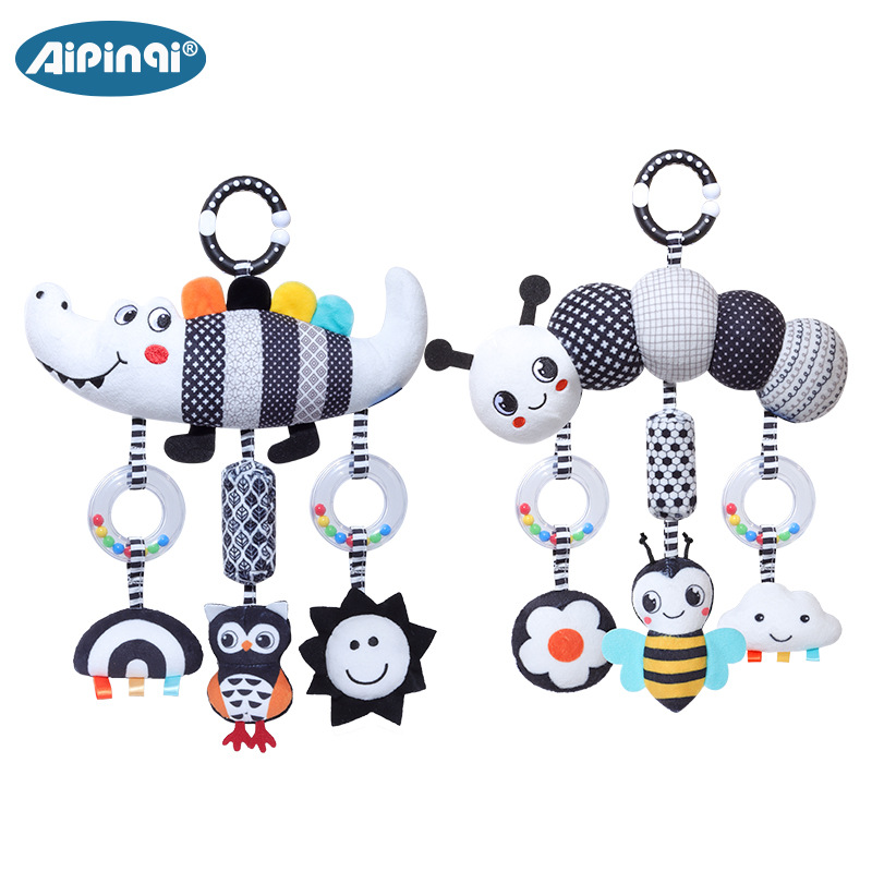 Aipinqi nuevo bebé blanco y negro campana de viento animal 0 - 3 años cocodrilo bebé juguetes de peluche al por mayor en stock