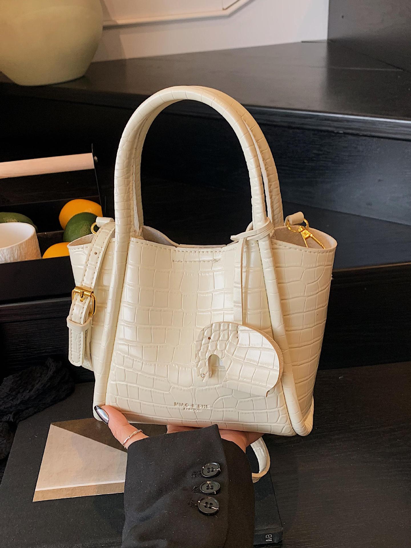 Bolso de canasta de verduras con patrón de cocodrilo transfronterizo para mujer 2025 nuevo bolso de cubo de mensajero casual simple de alta gama
