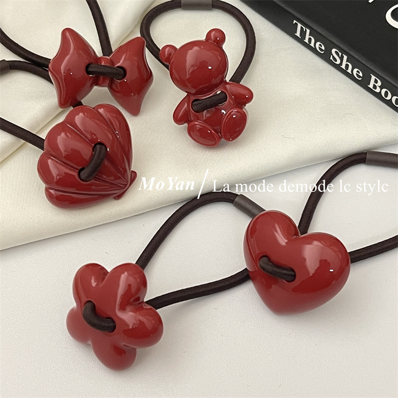 Red festive geometric hair rope with bow