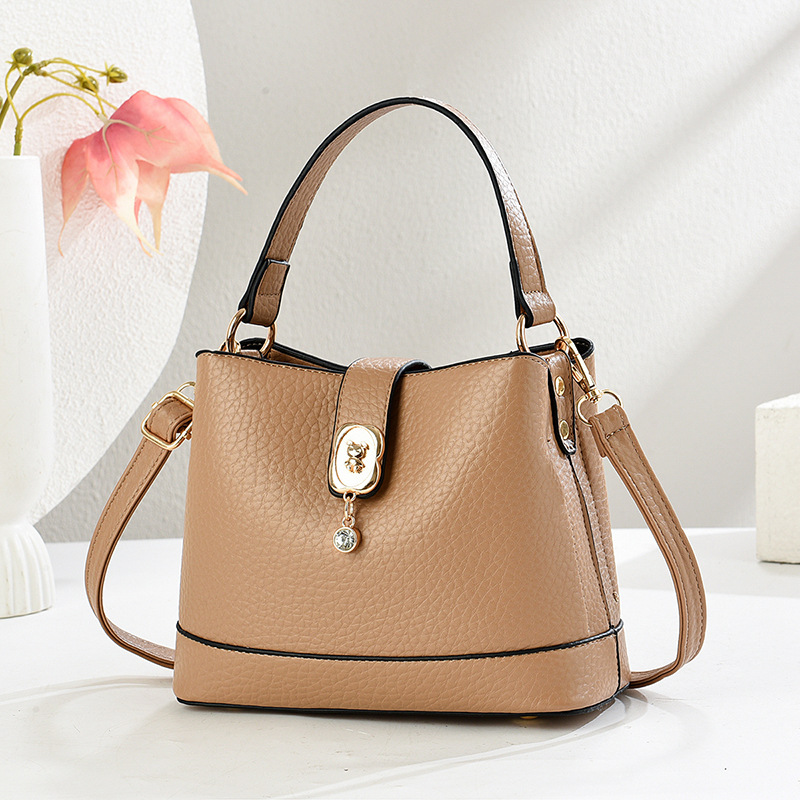 Bolso de cubo atmosférico 2025 nuevo bolso de moda de alta gama bolso de mensajero de todo fósforo casual bags transfronterizos