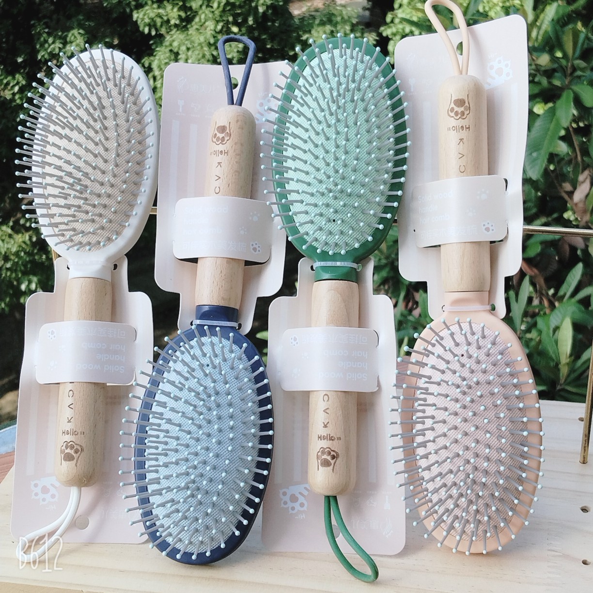 Bonito peine de peinado color macarrón con cojín de aire para masaje, adecuado para uso doméstico y dormitorios estudiantiles, cepillo de pelo de plástico suave con cojín de aire.