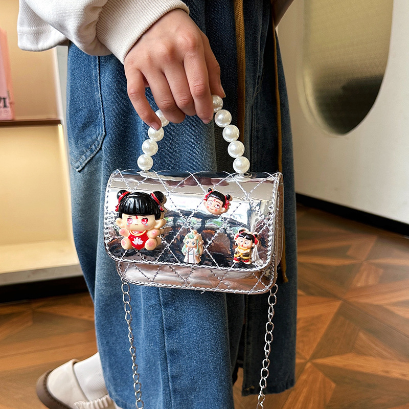 2025 nuevo niño pequeño viento mochila de hombro pequeña niña espejo princesa bolso de perla bolso de dibujos animados