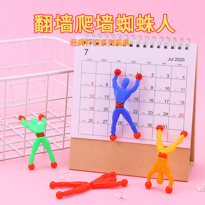 子供の新しい奇抜なアイデアはおもちゃの大きいサイズの壁に登るスーパーマンの13cmの壁に登るクモの人の粘りが壁に登るおもちゃを発散します。|undefined