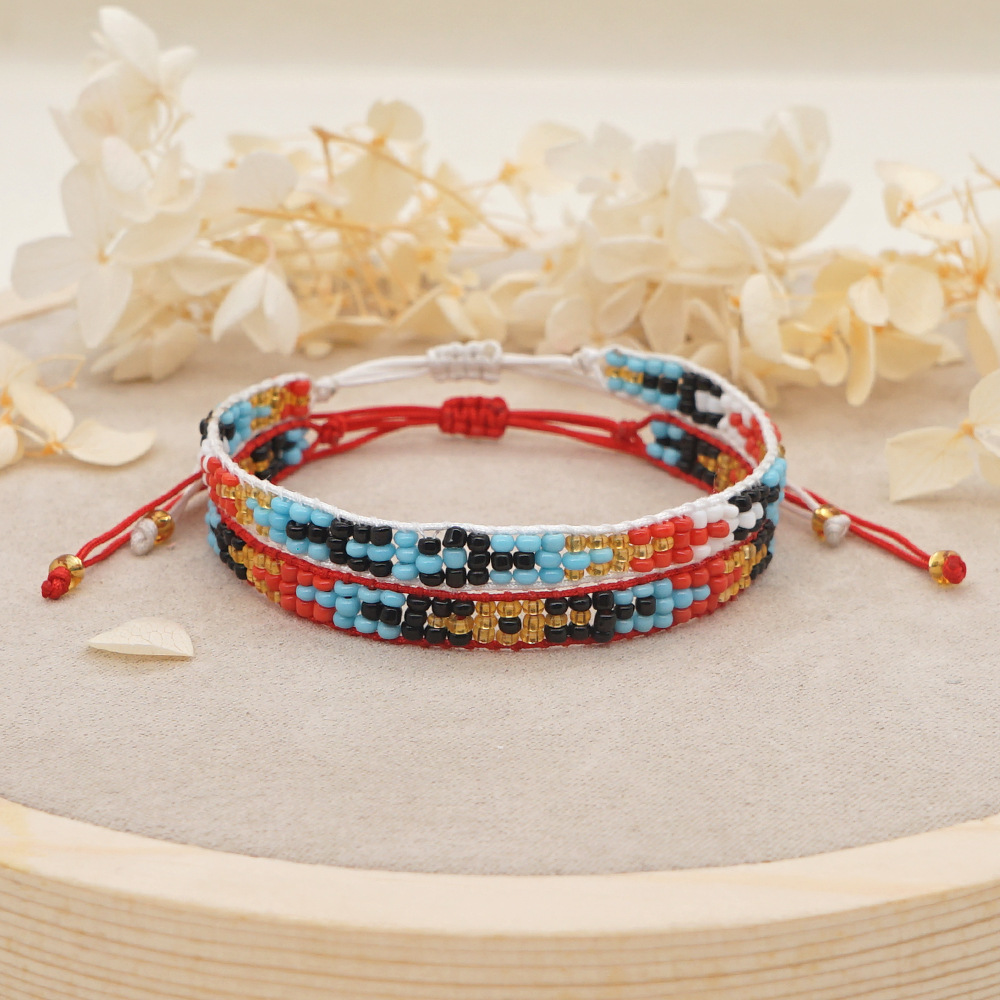 Bohemia Style Personality Fashion Three-row Rice Bead Woven Bracelet display picture 3