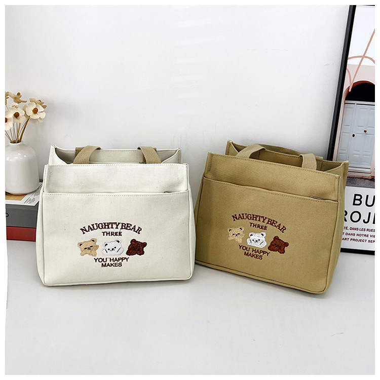 New wholesale fashionable and high-quality canvas handbag, simple and portable, easy to carry for going out, versatile lunch box and bento bag undefined