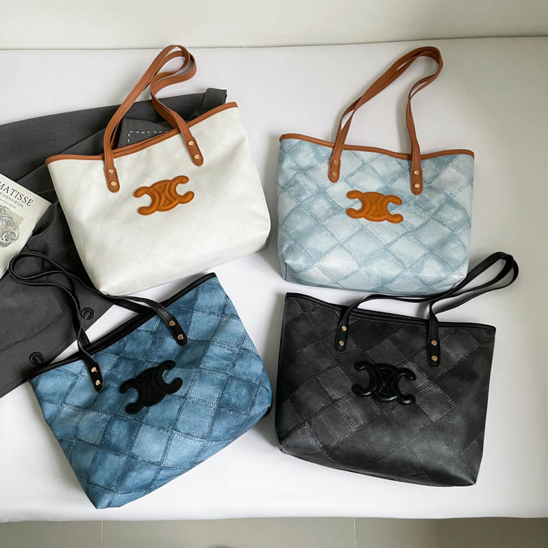 Bolsa de mano transfronteriza de gran capacidad para mujeres 2025, nueva sensación de alta calidad, bolso de hombro de viaje universal, bolso de moda