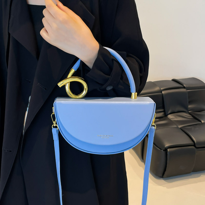 Comercio exterior transfronterizo retro diseño semicircular bolsa de silla de montar para mujeres 2025 nueva moda versátil bolsa de hombro portátil