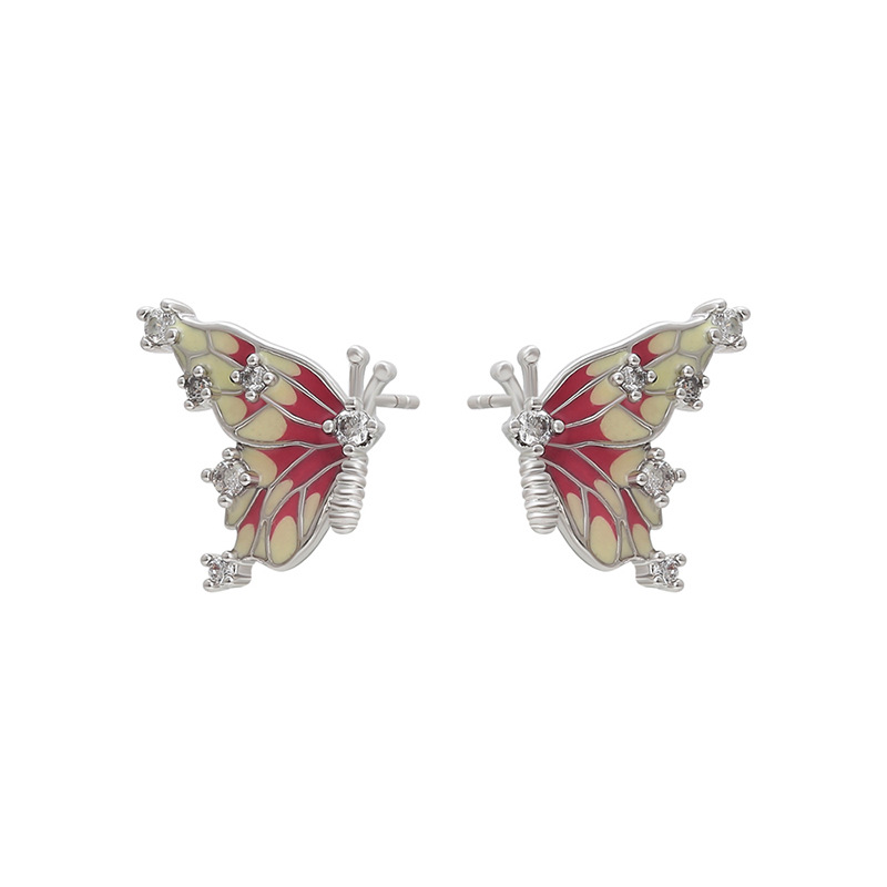 Xuping incrustado joyas artificiales aleación de cobre chapado blanco mariposa pendientes de esmalte de color goteo serie de pendientes al por mayor