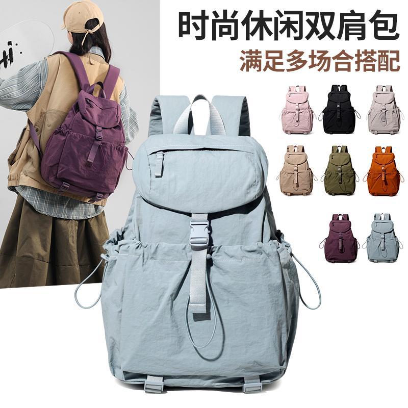 户外旅行双肩包女士2025新款大学生书包时尚百搭轻便小型背包男