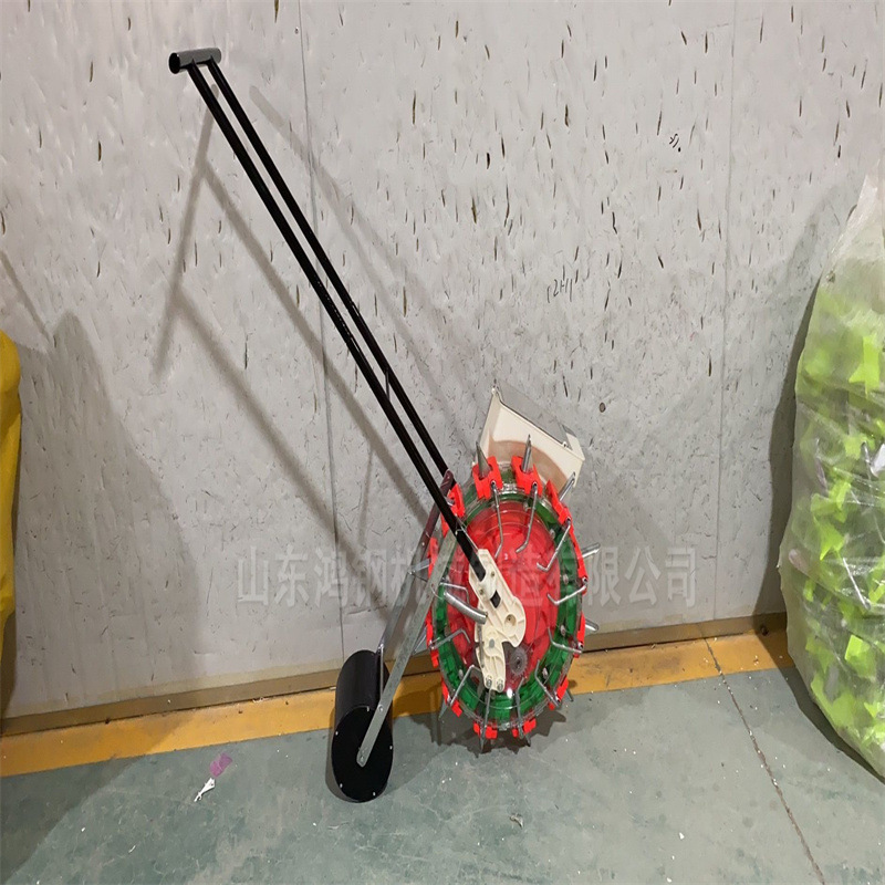 手推式滚轮播种机 小型手持手推粮食种植机 农田家用菜园播育机