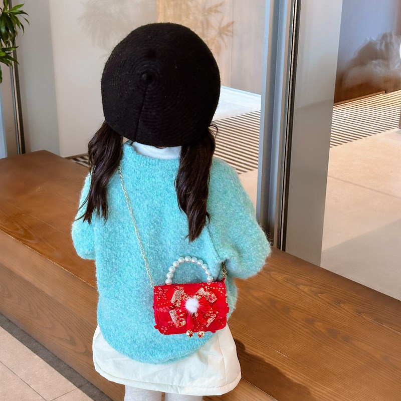 Pequeño viento rojo perfumado bolsos de Año Nuevo para niños y niñas lindos bolsos de perlas de arco 2025 nuevos bolsos de cadenas para niños