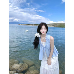 女性のセット2025夏の新型の甘くて優しい風のデザイン感のハスの葉の縁の偽の2つの上着の高腰の半身のスカート