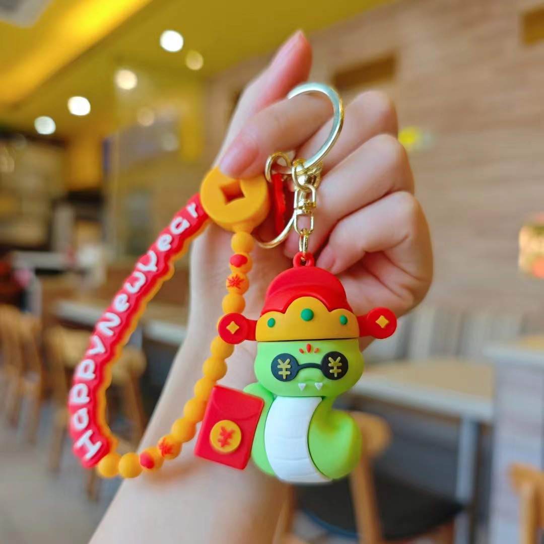 2025 Año de la Serpiente Año de la Serpiente Keychain Lions Colgante Mochila de dibujos animados Colgante Regalo de Fiesta de Cerradura de Automóviles