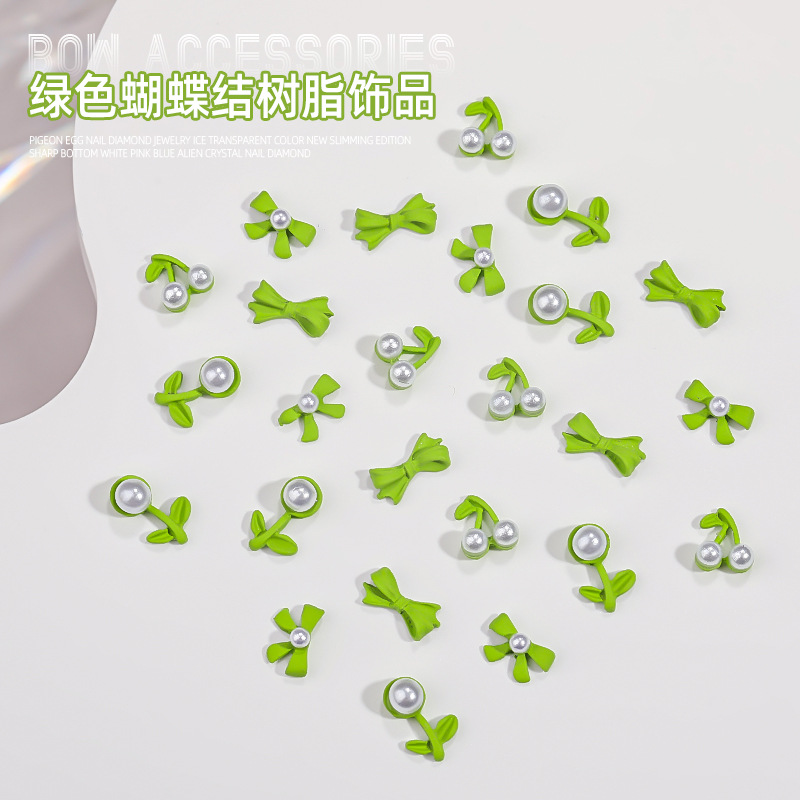 green small jewelry with bow