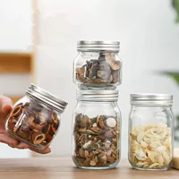 Оптовая продажа в наличии Fangyuan Mason Jar Утолщенная стеклянная банка для хранения Прозрачное стекло Бутылка для солений Жестяная крышка банки
