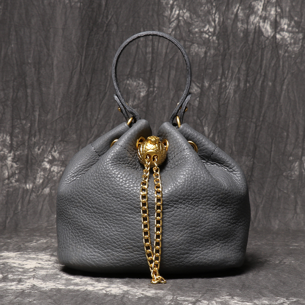 新しい手作りのトップ層牛革化粧バッグファッションカジュアルな真皮バケツバッグ高品質ソフトレザーチェーンバッグ